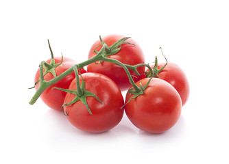 Cherry tomatoes isolated over white background