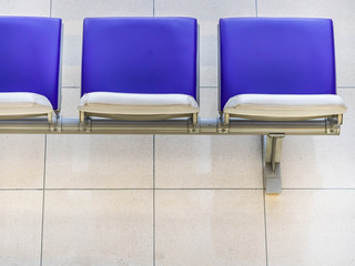 Top view of airport waiting chairs or seating within the terminal.