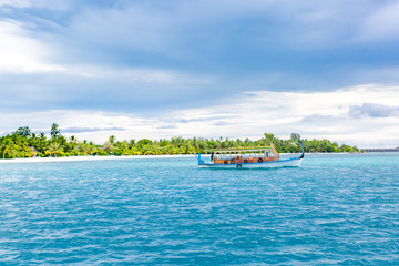 Maldives traditional boat, Dhoni. Tropical background with wooden boat