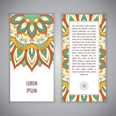 Greeting card or Invitation template with ethnic mandala ornament. Hand drawn vector illustration