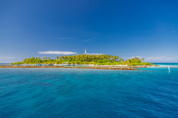 Maldives island port, boats and nature background