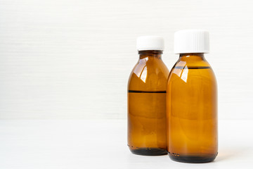 Medicine bottles of brown glass