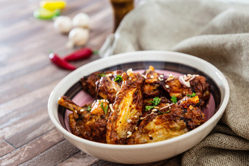 roasted sleeves chicken with potatoes and barbecue sauce