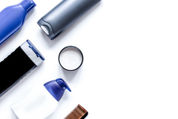 cosmetics for men in bottle on white background top view