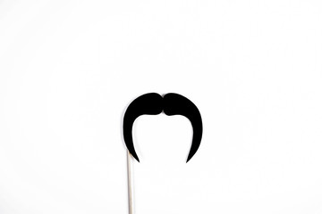 Movember concept. Annual event involving growing of moustache & beard during month in November to...