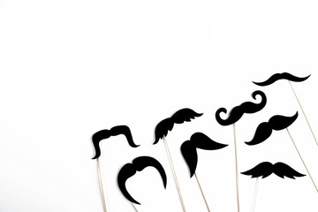 Movember concept. Annual event involving growing of moustache & beard during month in November to...