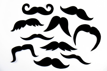 Movember concept. Annual event involving growing of moustache & beard during month in November to...