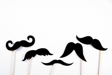 Movember concept. Annual event involving growing of moustache & beard during month in November to raise awareness of men's health issues and prostate cancer. Background, close up, copy space, flat lay