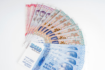 Various Icelandic banknotes isolated on white background