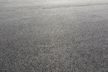 Black asphalt road,background texture close-up