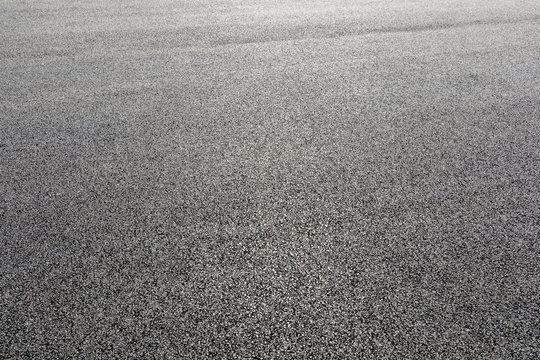 Black asphalt road,background texture close-up