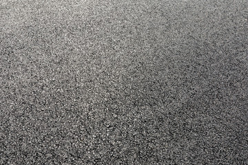 Black asphalt road,background texture close-up