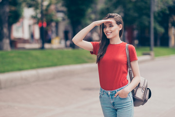 Nice charming attractive cute young cheerful smiling girl outdoo