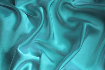 soft drape from satin fabric turquoise color