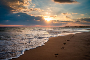 Sri Lanka beach with waves and cloud