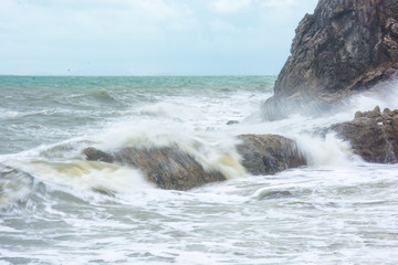 sea waves hit the rocks