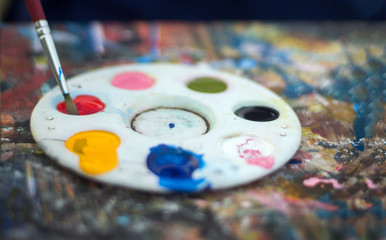 close up water color palette and brush