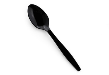 black plastic spoon on isolated white background

