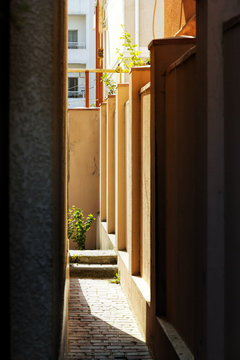 Fototapeta Narrow street , old European city, summer time