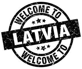 welcome to Latvia black stamp