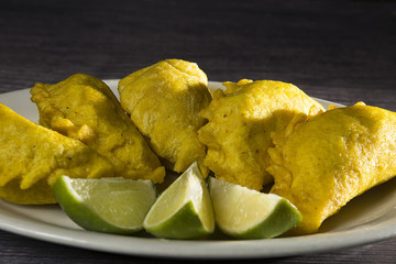Colombian pies on the wooden table