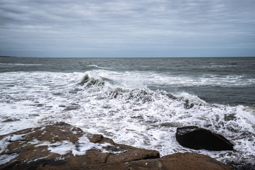 Fototapeta na wymiar waves of the Atlantic Ocean crashing against the rocks