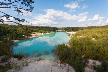Fototapeta na wymiar turquoise lake in the pine forest, Kyshtym, Russia
