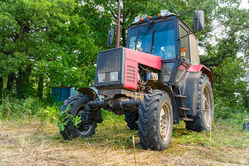 Tractor for working in the field and mowing grass. Agricultural machinery