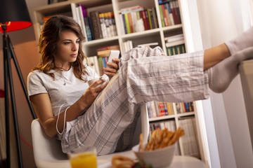 Woman sending a text message