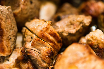 Pieces of tasty roasted meat close up