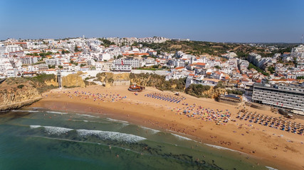 Obraz premium Aerial view of city of Albufeira, beach pescadores, in the south of Portugal.