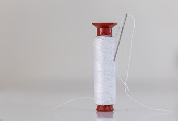 needle thread spool