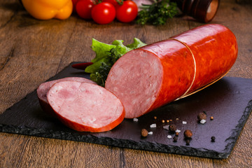 Pork sausages over wooden