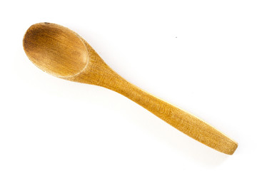 Wooden spoon on white background