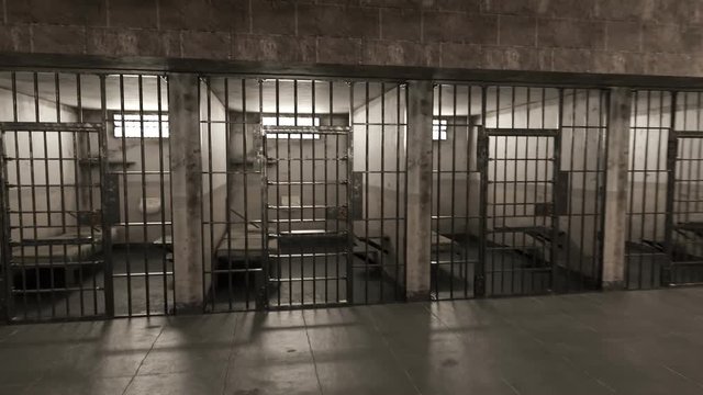 Jail hallway. Prisoner enters into the old awful prison cell and it closes.