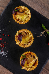 Canape with mushroom and cheese