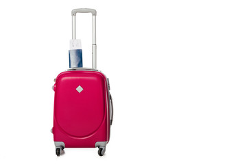 close up view of pink suitcase, passport and ticket isolated on white