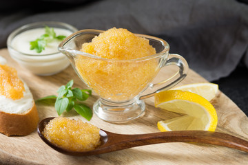 Pike caviar on wooden board