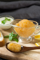 Pike caviar on wooden board