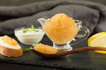 Pike caviar on wooden board