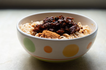 Instant noodle in Colorful Ceramic bowl and Seasoning