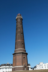 leuchtturm auf der norsee insel borkum deutschland fototgrafiert w&auml;hrend einer sightseeing tour auf der nordseeinsel borkum mit weitwinkelobjektiv