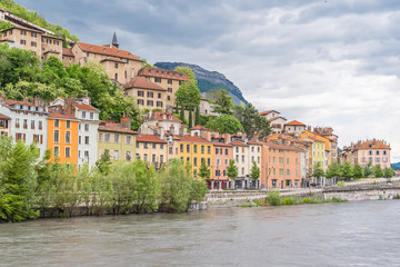 Grenoble, beautiful typical houses on the river Isere, in the old town

