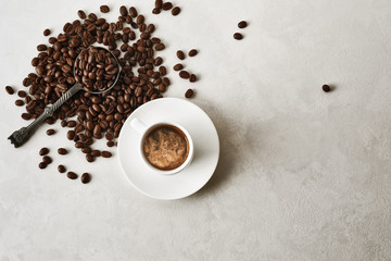 Coffee cup and beans