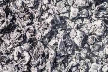 The texture of ash. Natural background of gray ash.