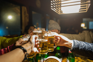 Cheering, drinking and toasting beer during on travel 