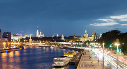 Naklejka na ściany i meble Moscow Kremlin, Kremlin Embankment and Moscow River at night in Moscow, Russia. Architecture and landmark of Moscow