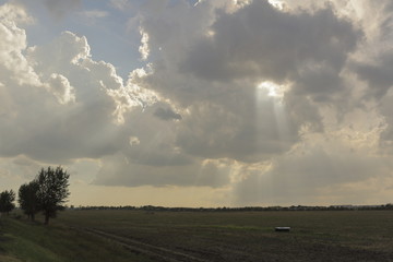 behind the clouds the sun