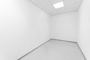 Empty room with white walls.