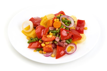 Healthy snack of assorted farm fresh roast vegetables in a white plate, isolated on white backgound.